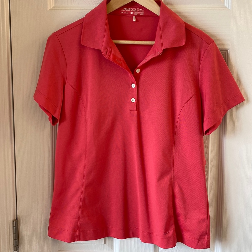 Pink Nike dri-fit golf shirt